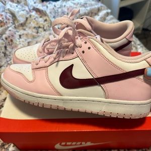 Women’s pink foam with red dunks